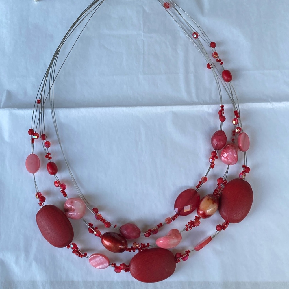 Silver strings necklace with arrange of beautiful red-pink beads